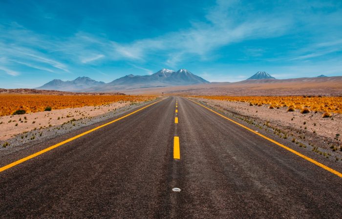 lone road going to mountains